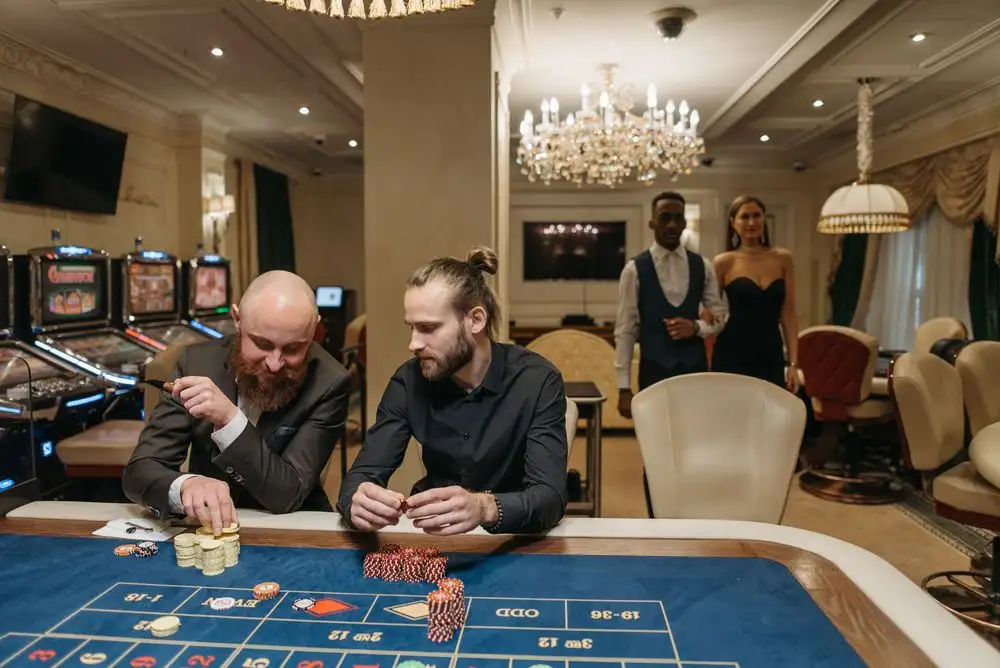 Elegant guests at a casino table